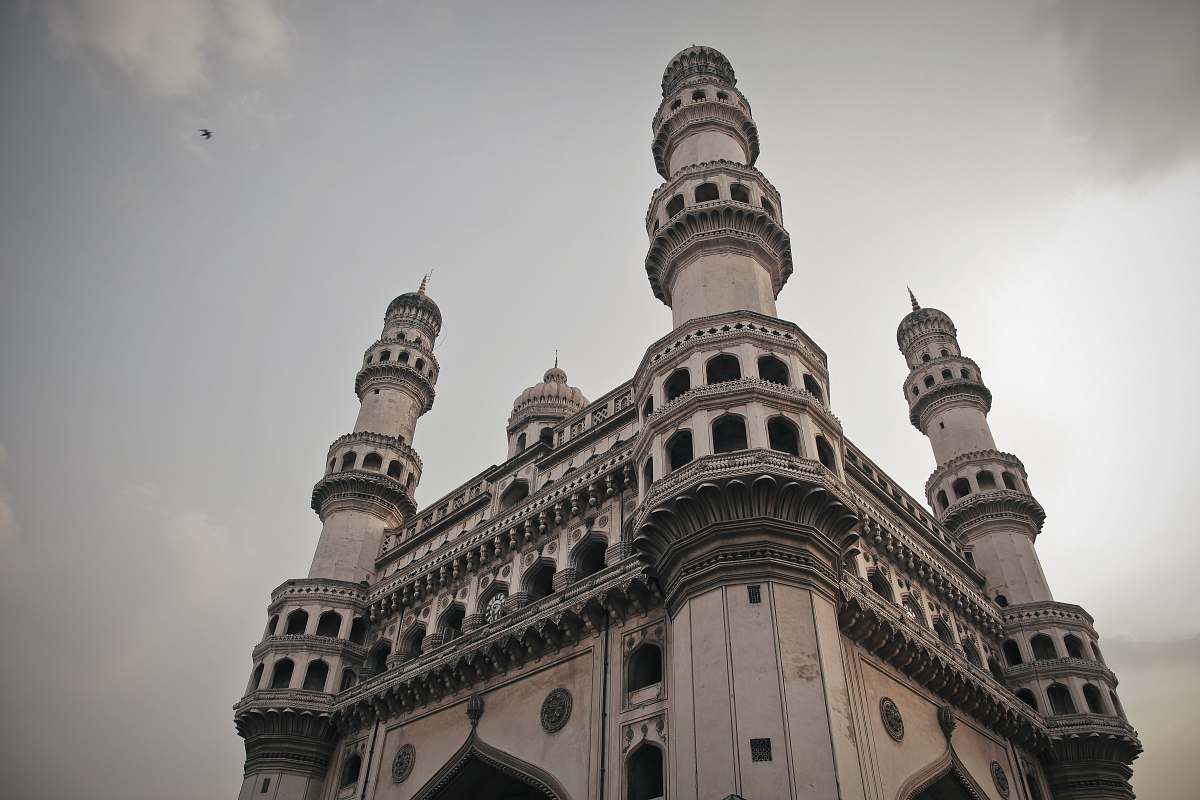 architecture low angle photography of white and black concrete building tower