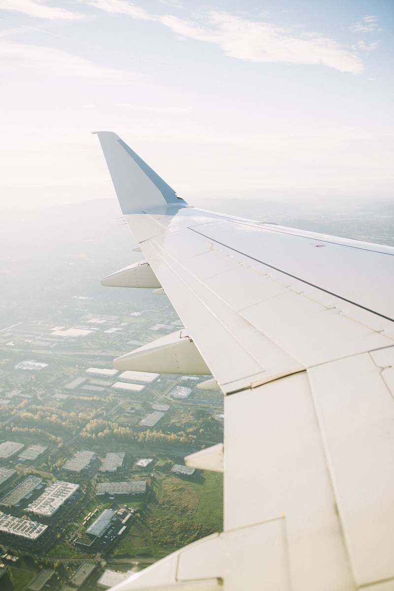 travel plane right wing aircraft