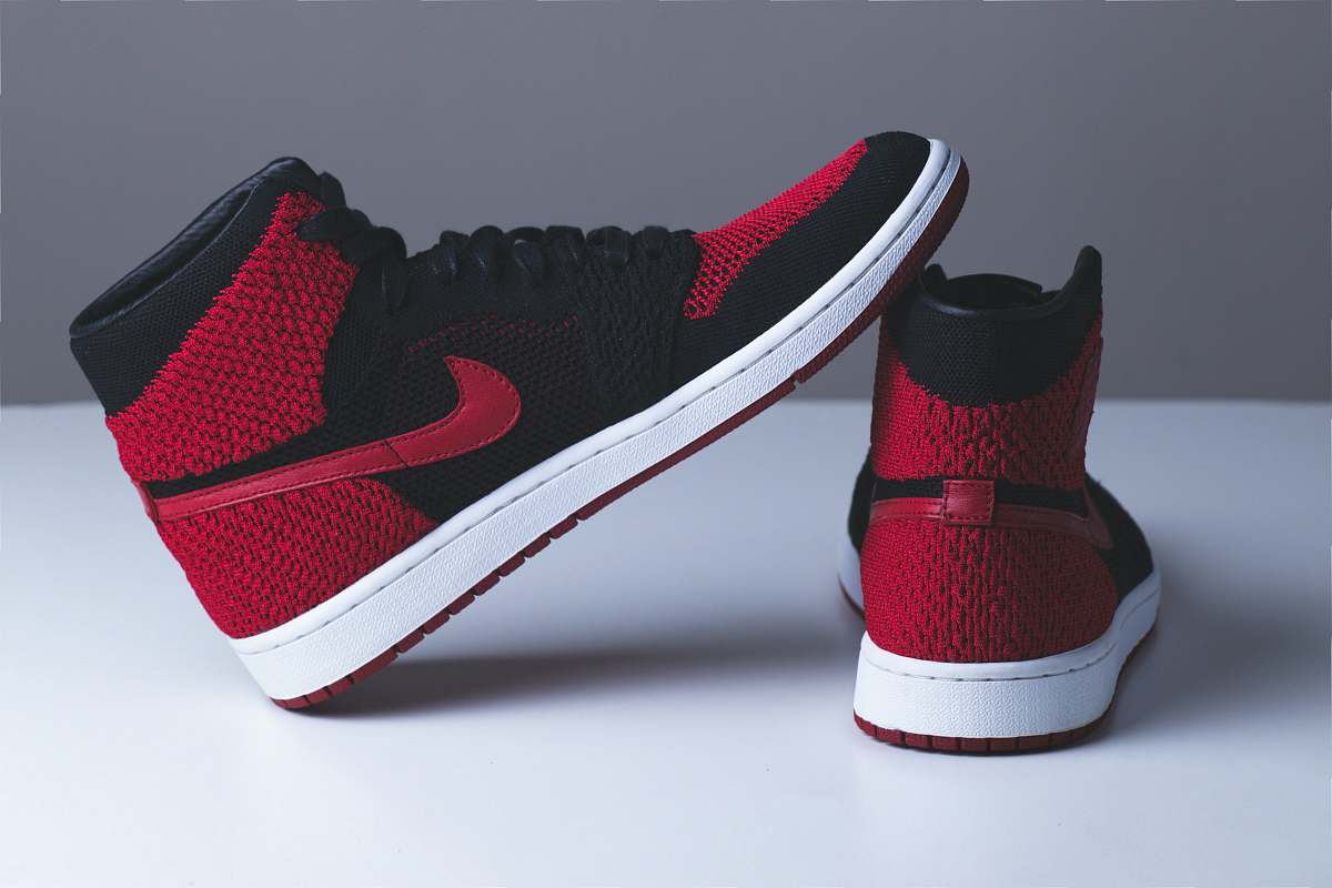 clothing pair of red and black Nike sneakers footwear