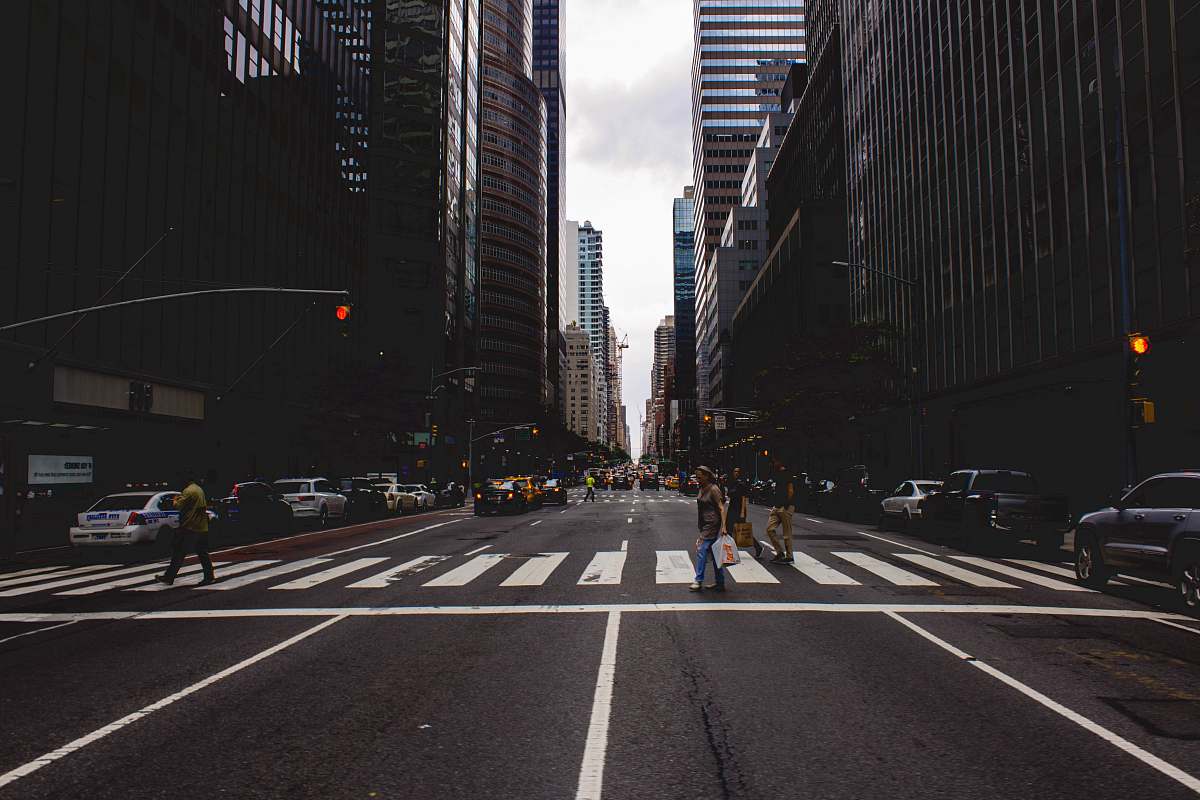 road people walking on pedestrian lane intersection