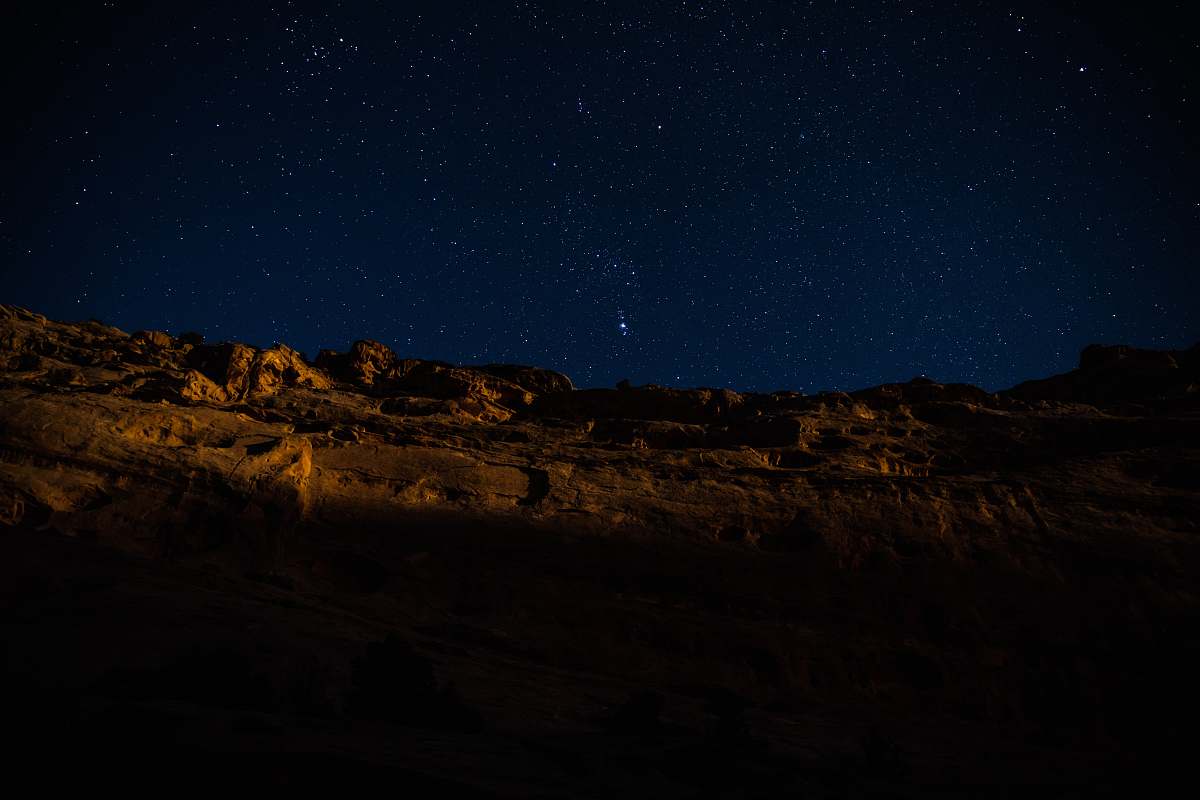 night landscape photography of hill during nighttime outdoors