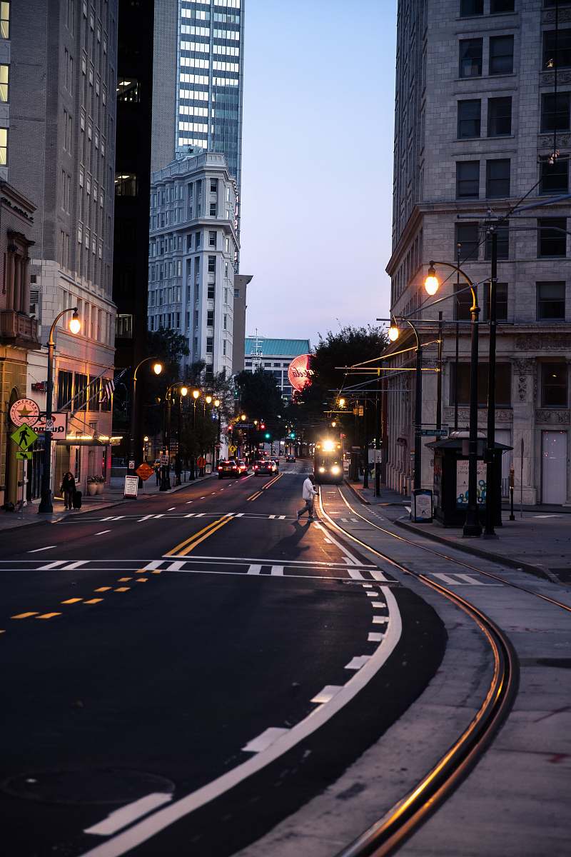 building person walking on pedestrian lane road