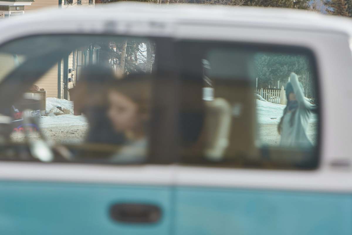 car man and woman riding vehicle transportation