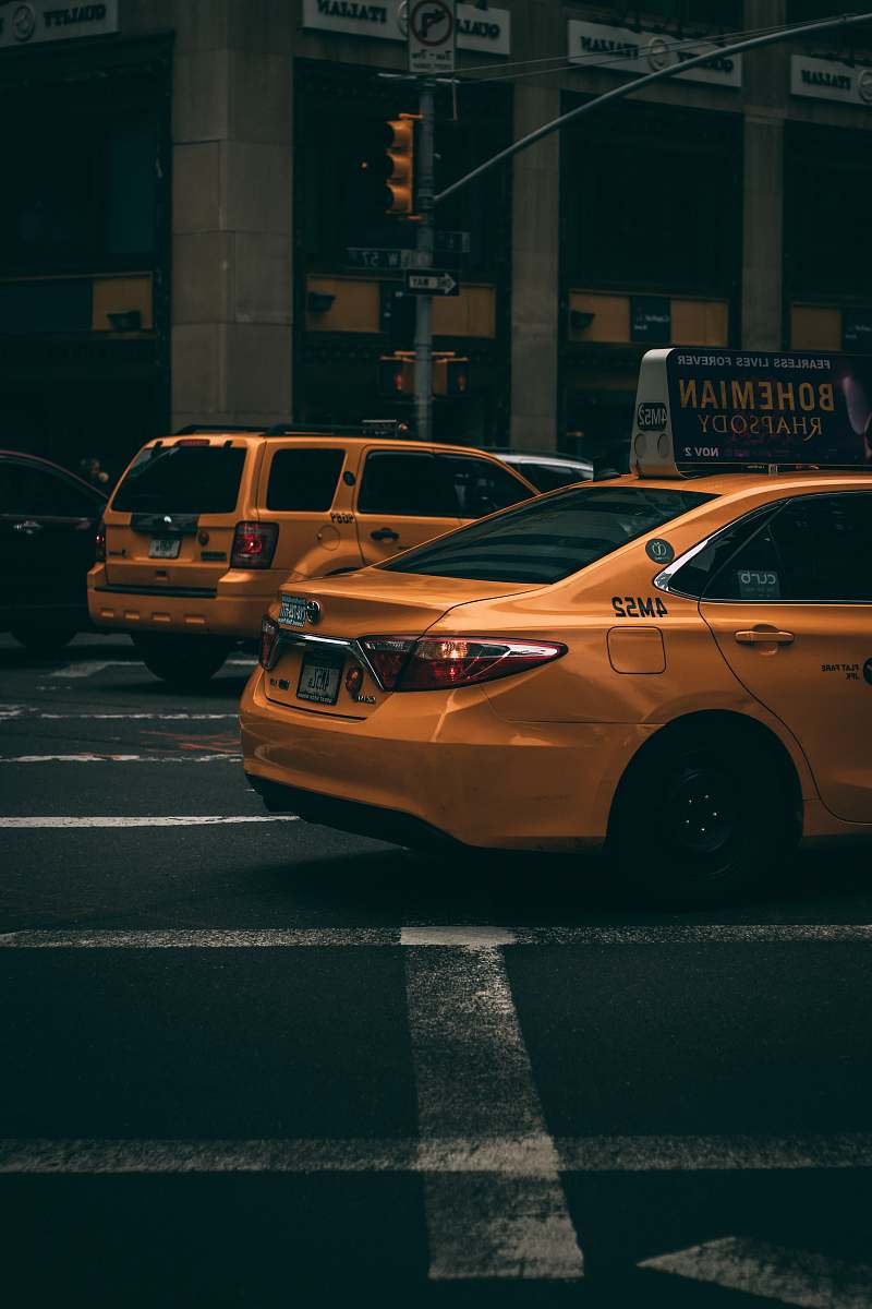 cab orange cars on road car