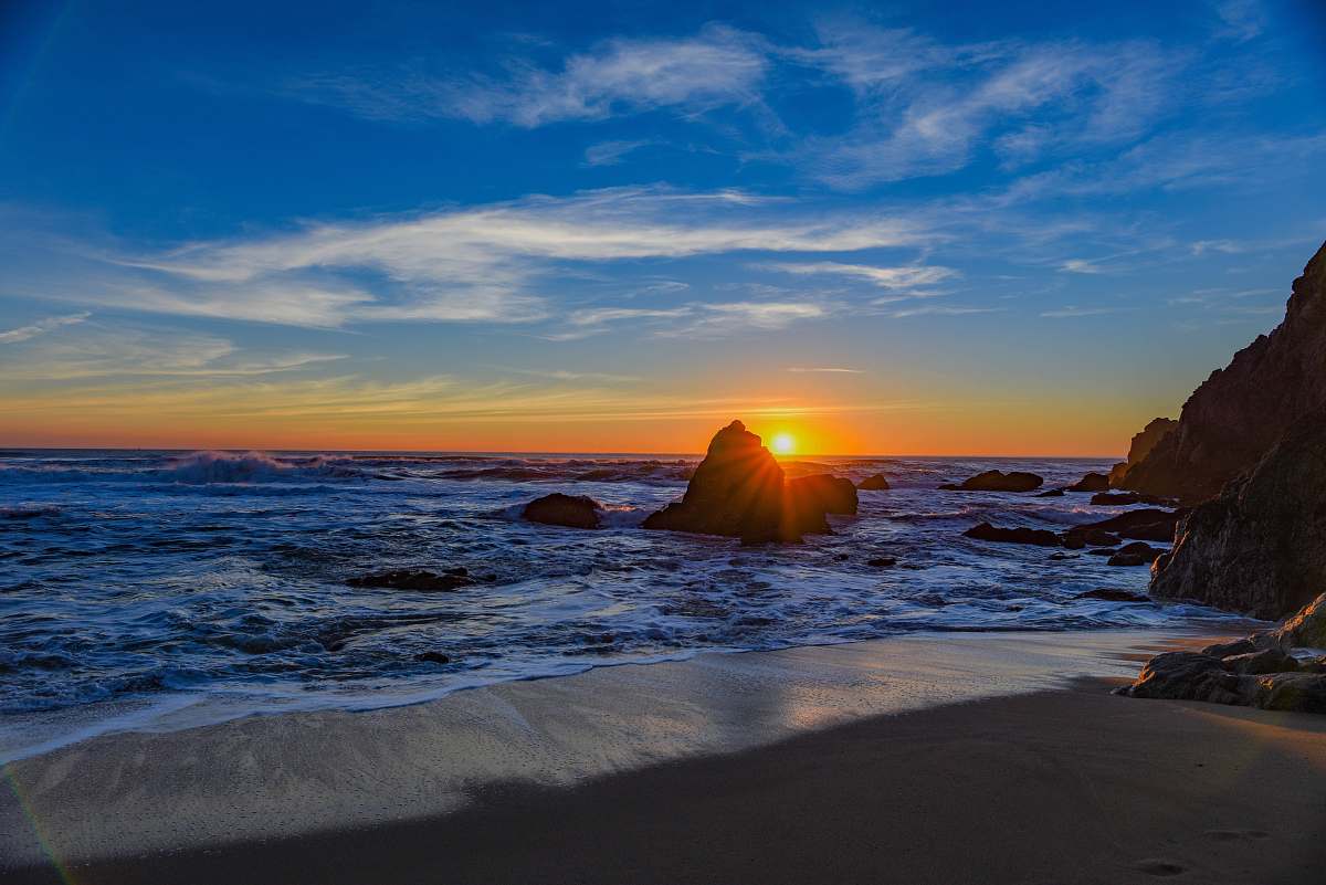 coast sunset in front of beach ocean