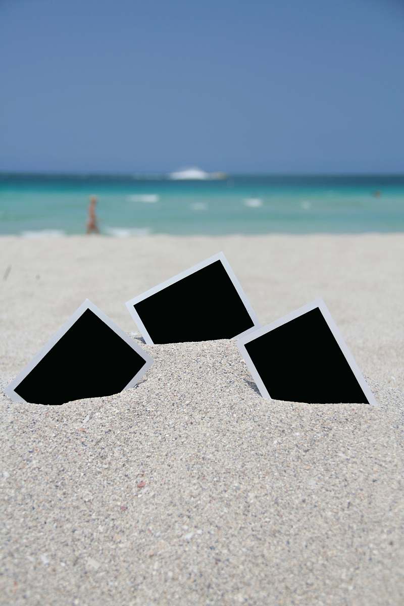 water three photo frames on seashore near sea ocean