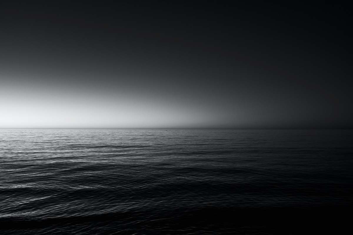 grey grayscale photo of sea water
