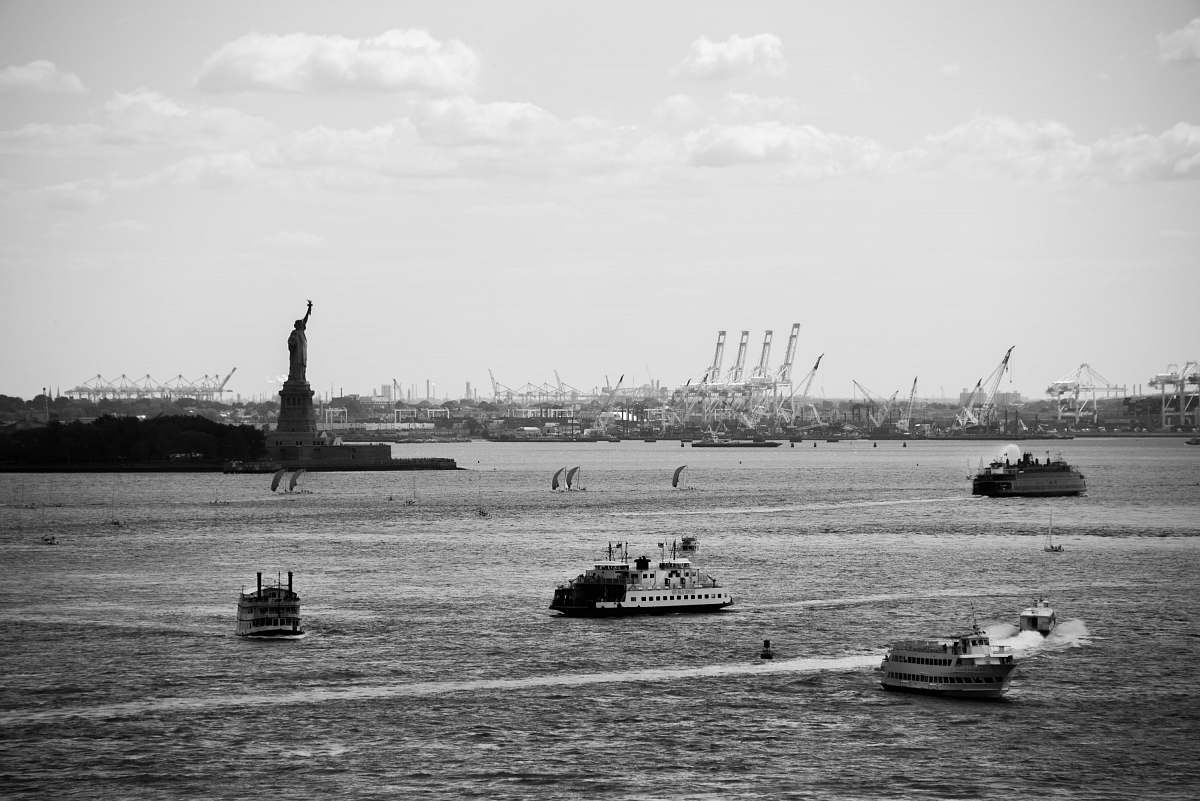 boat grayscale photo of ships on body of water vehicle