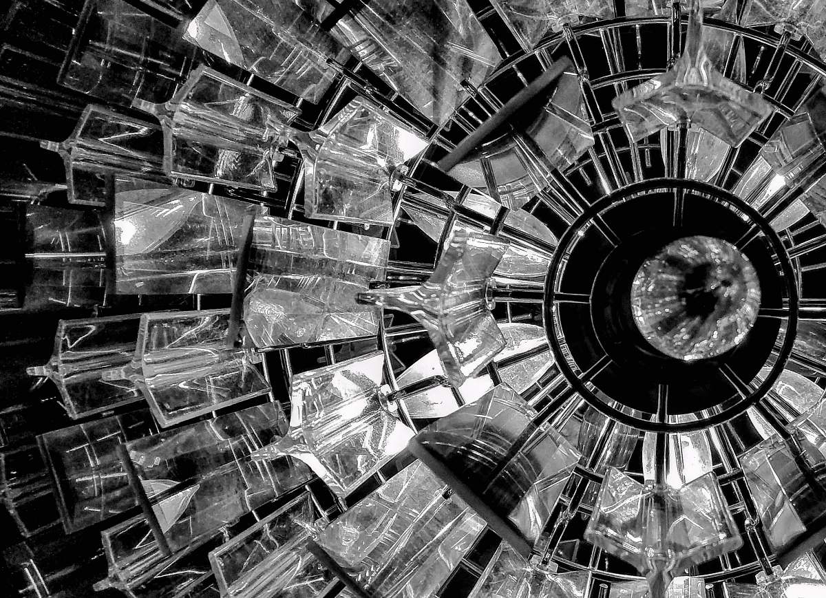 machine grayscale photography chandelier engine