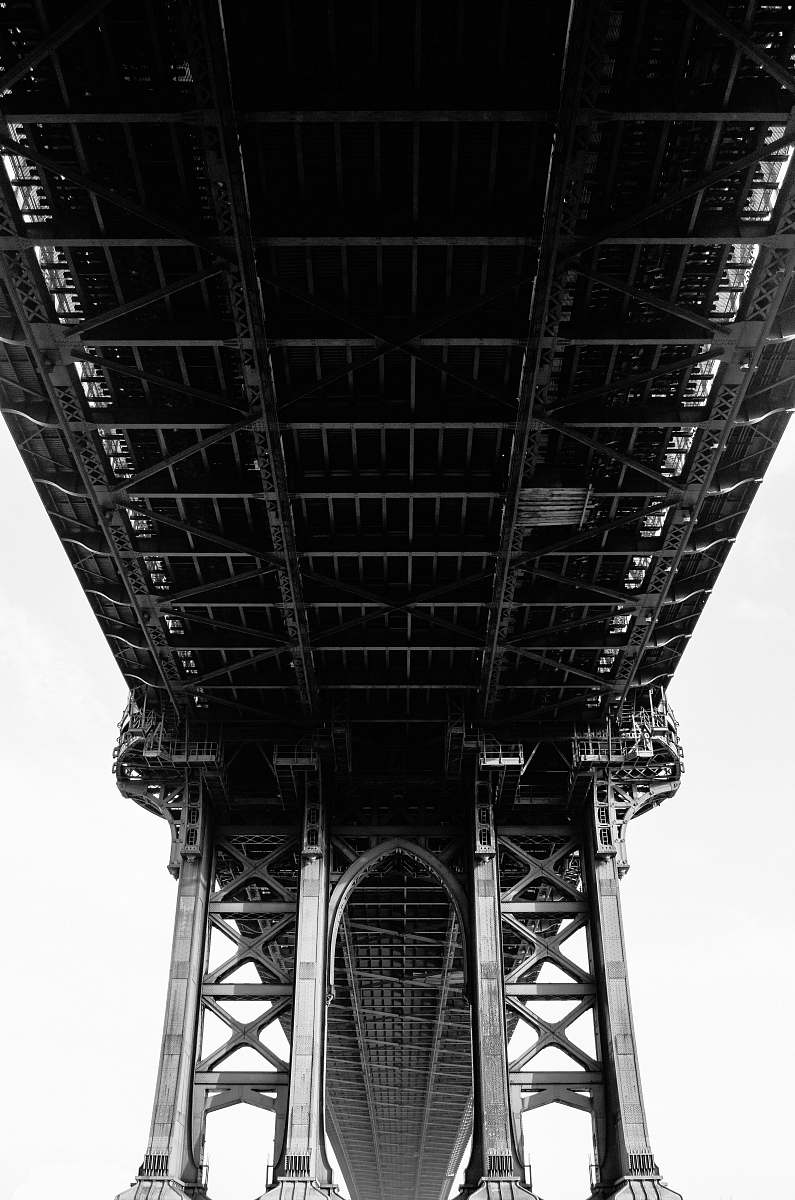 architecture grayscale photography of suspension bridge building