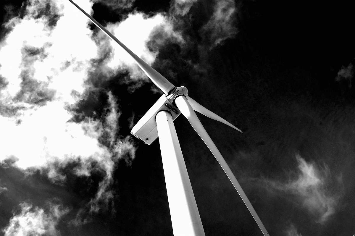 whitewater grayscale photography of windmill cross