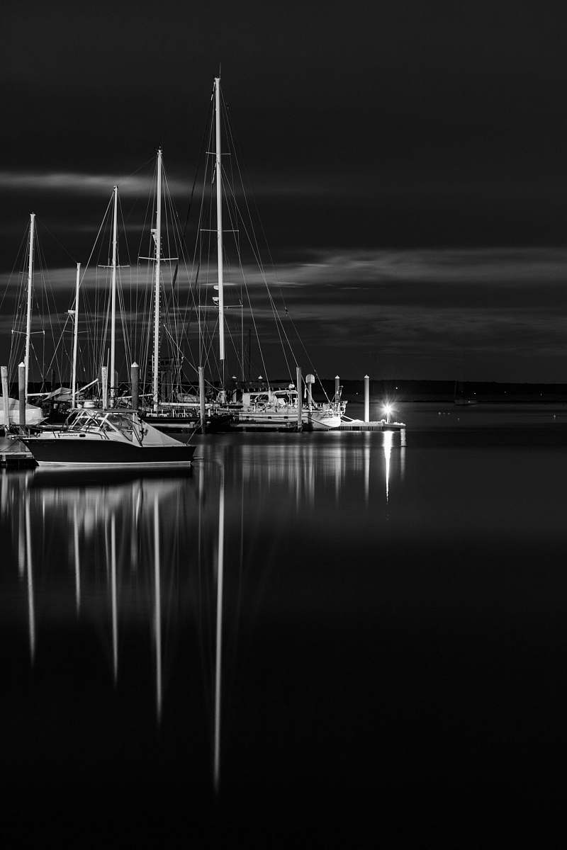 transportation greyscale photo of boat on top of water vessel