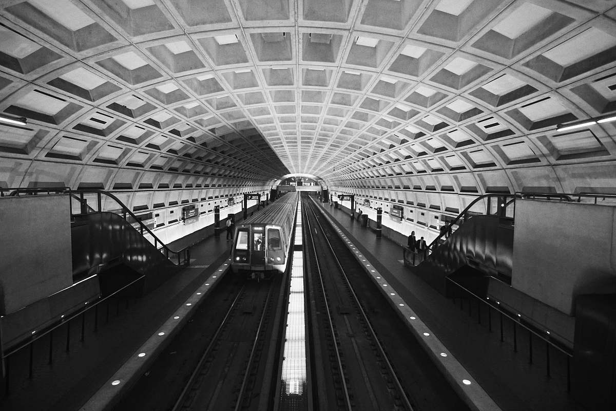 train greyscale photography of train in train station transportation