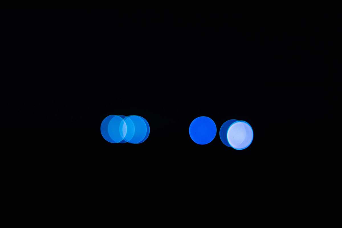 laton bokeh light photography of blue and white lights united states