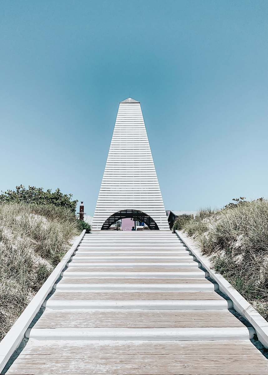 triangle white concrete tower seaside beach