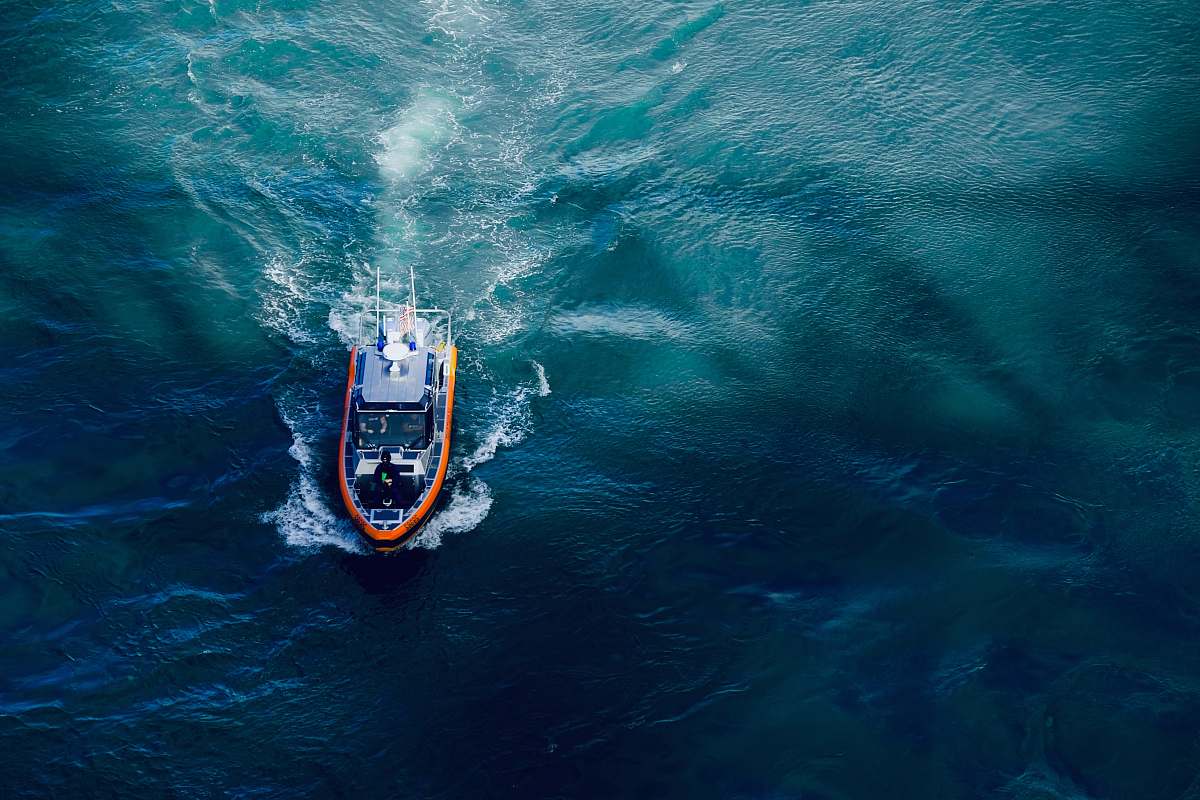 transportation aerial photography of boat on body of water vehicle