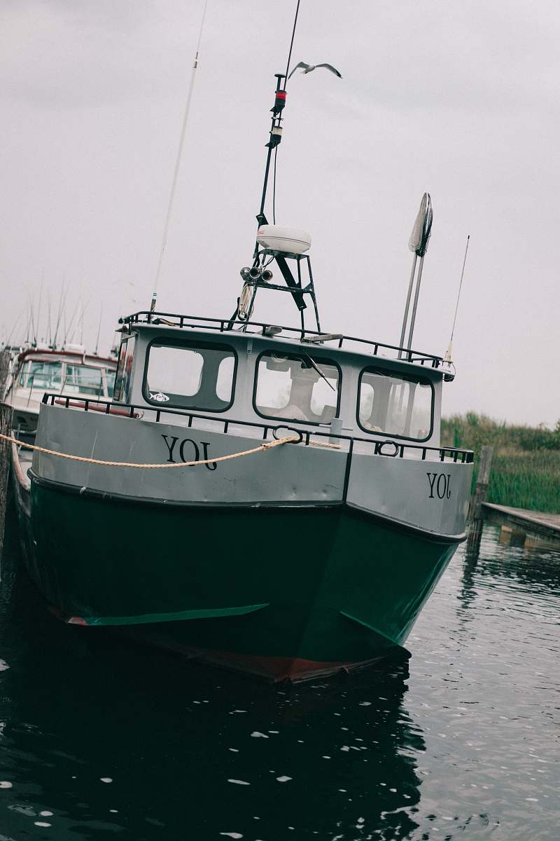 vessel white and green boat transportation