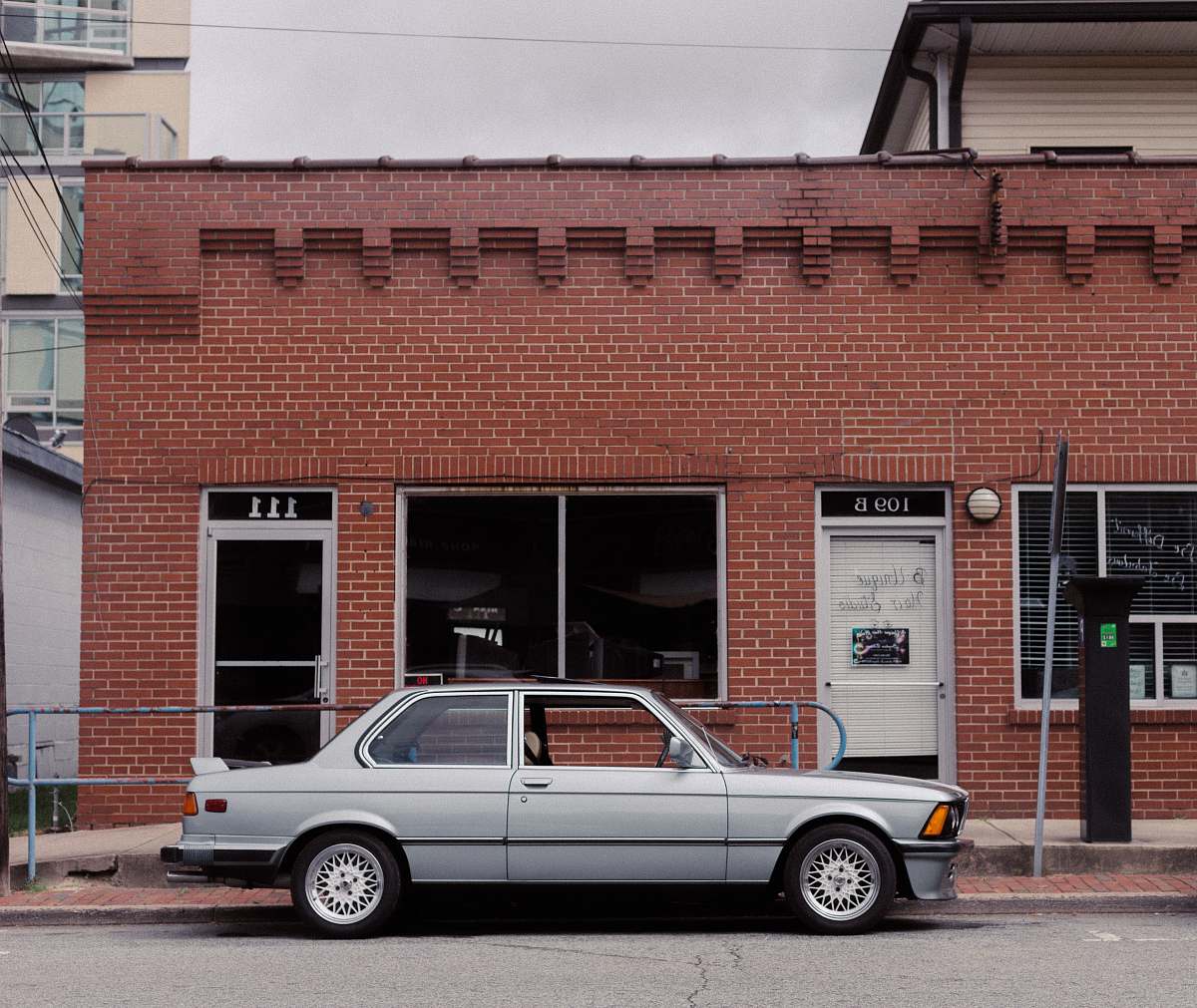 vehicle gray sedan on road car