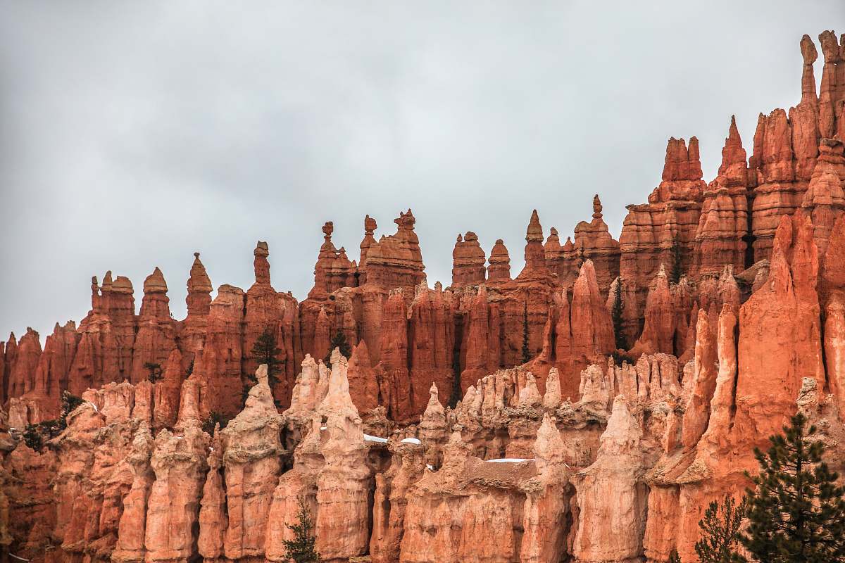 nature brown rock formation under white clouds during daytime architecture