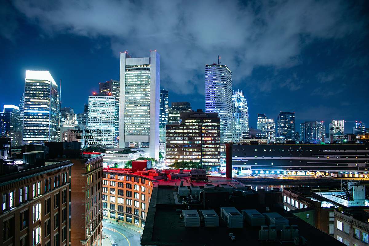 city buildings during night time downtown