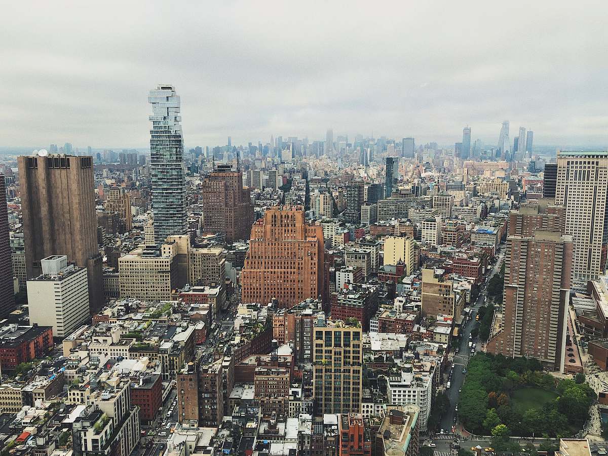 city city with high-rise buildings under white skies town
