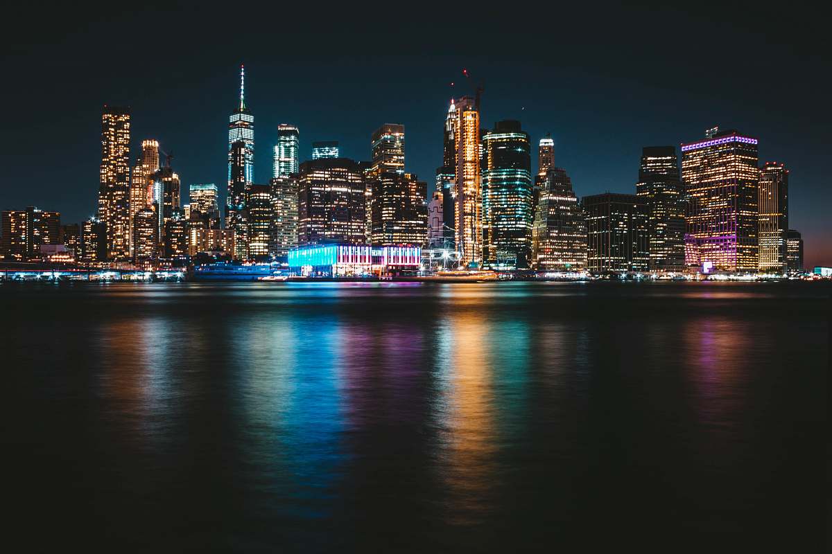 city city with lights turned-on during nighttime downtown