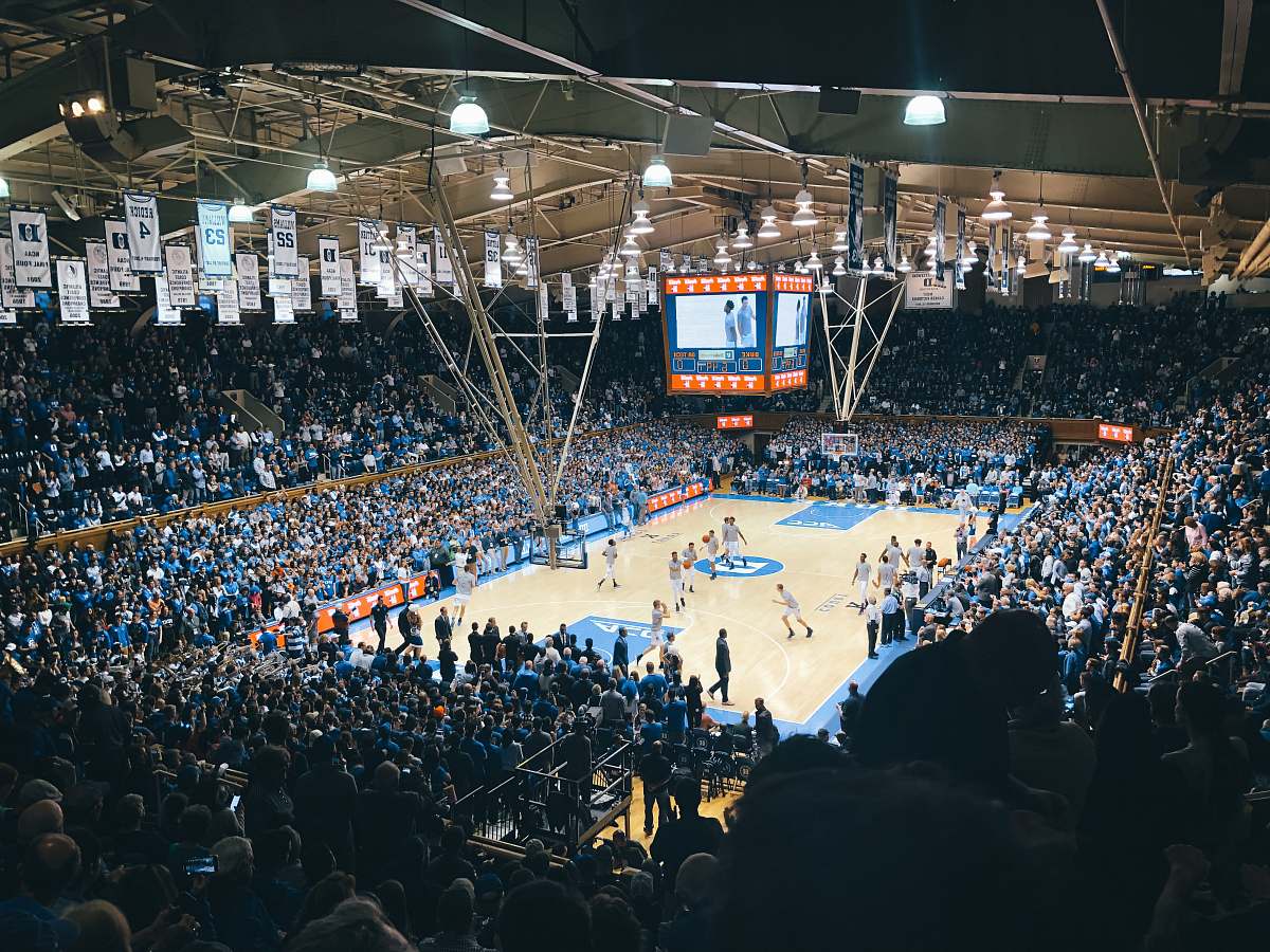 human group of people at basketball stadium person