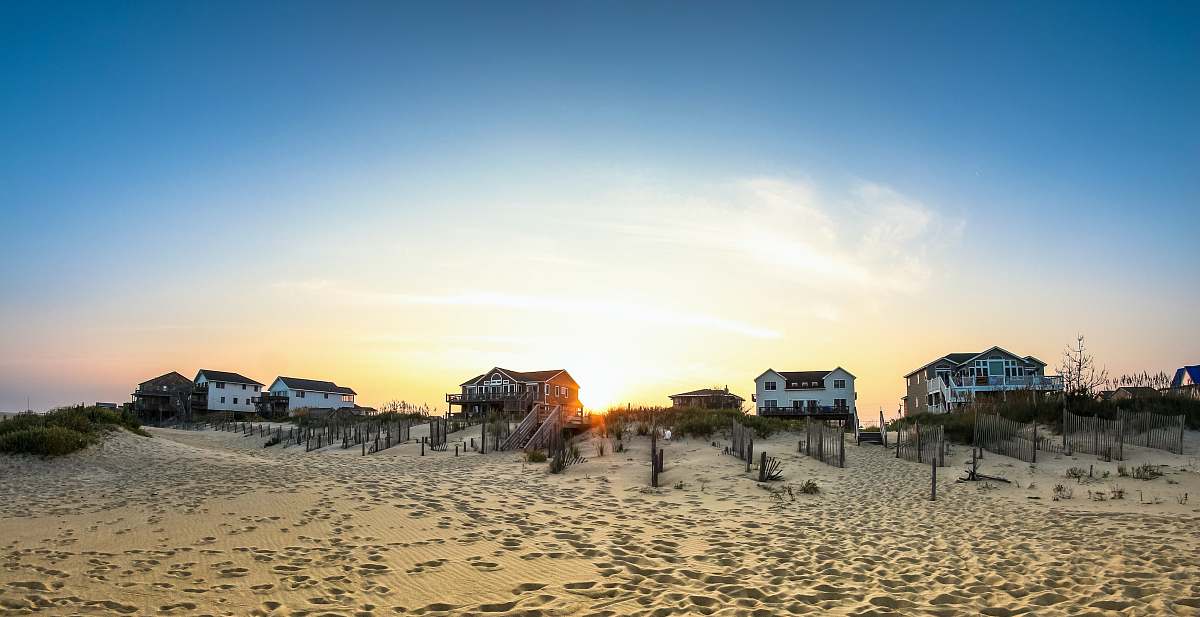 house houses on seashore sand