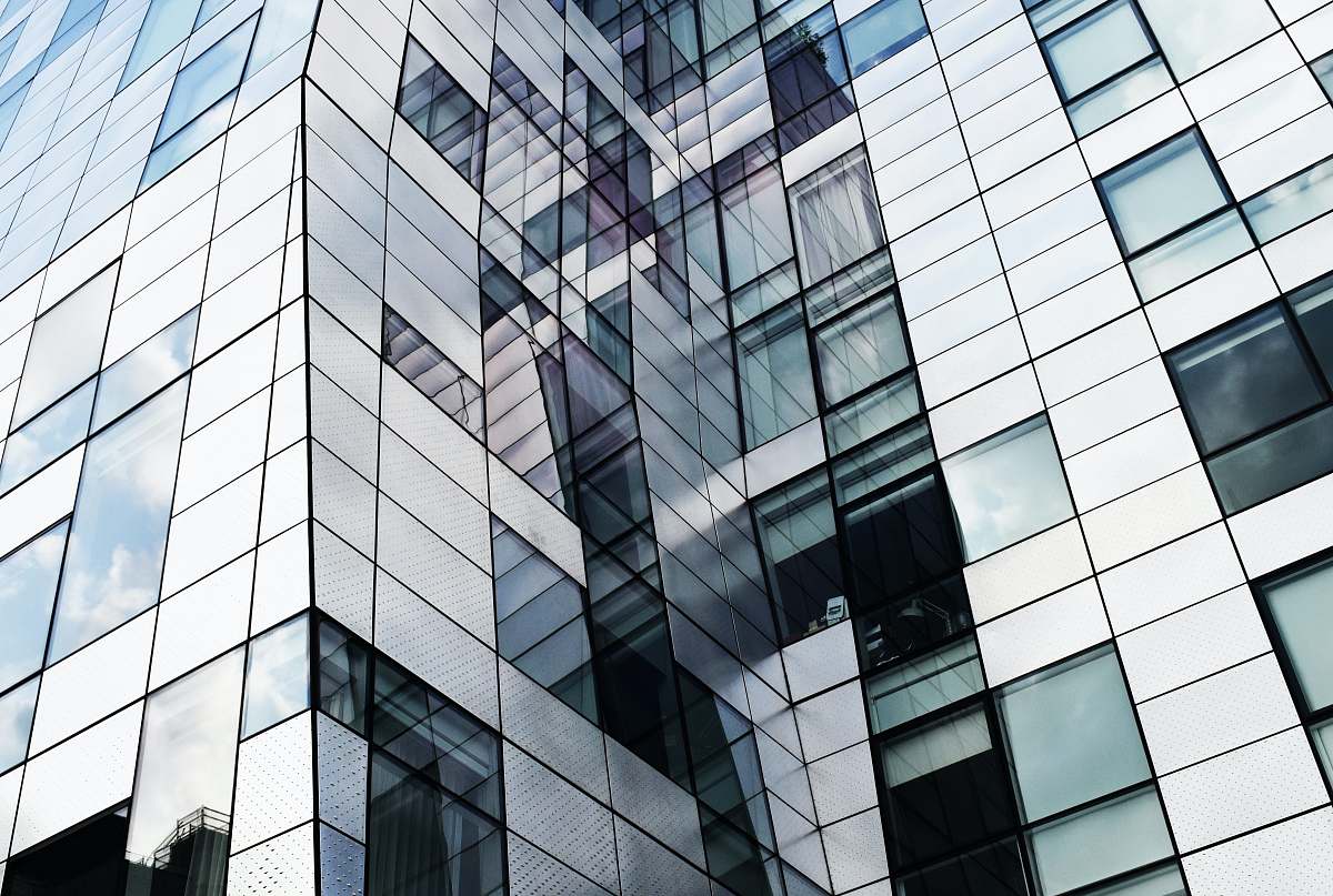 architecture photo of white concrete building during daytime skyscraper