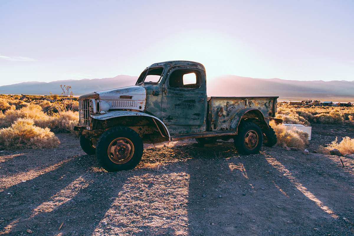 tractor gray single cab truck on brown farm transportation
