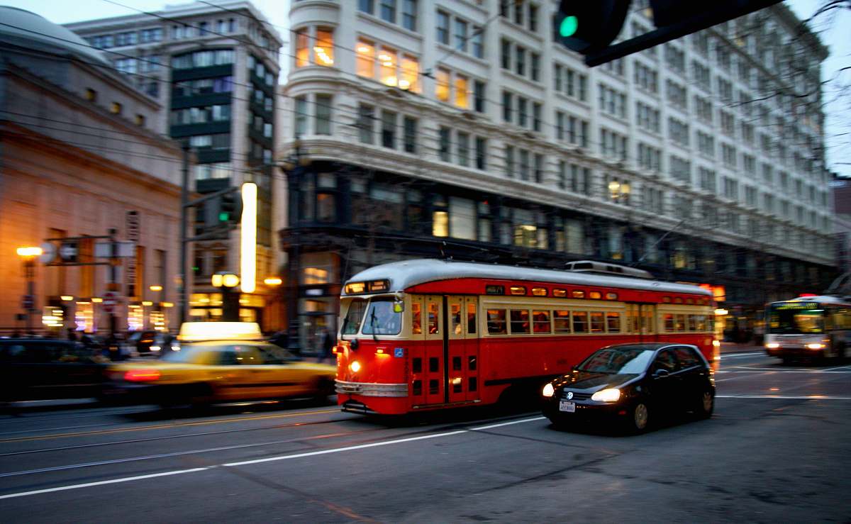vehicle bus near black building transportation