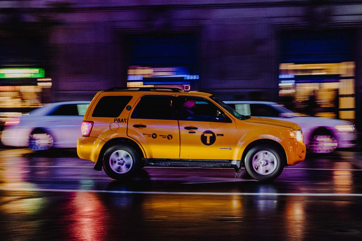 taxi yellow SUV vehicle