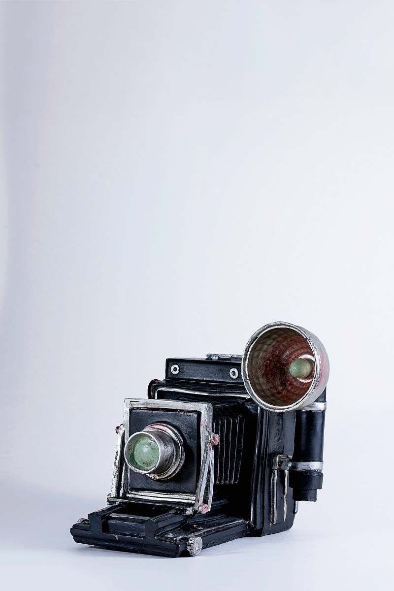 electronics folding camera on white surface raleigh