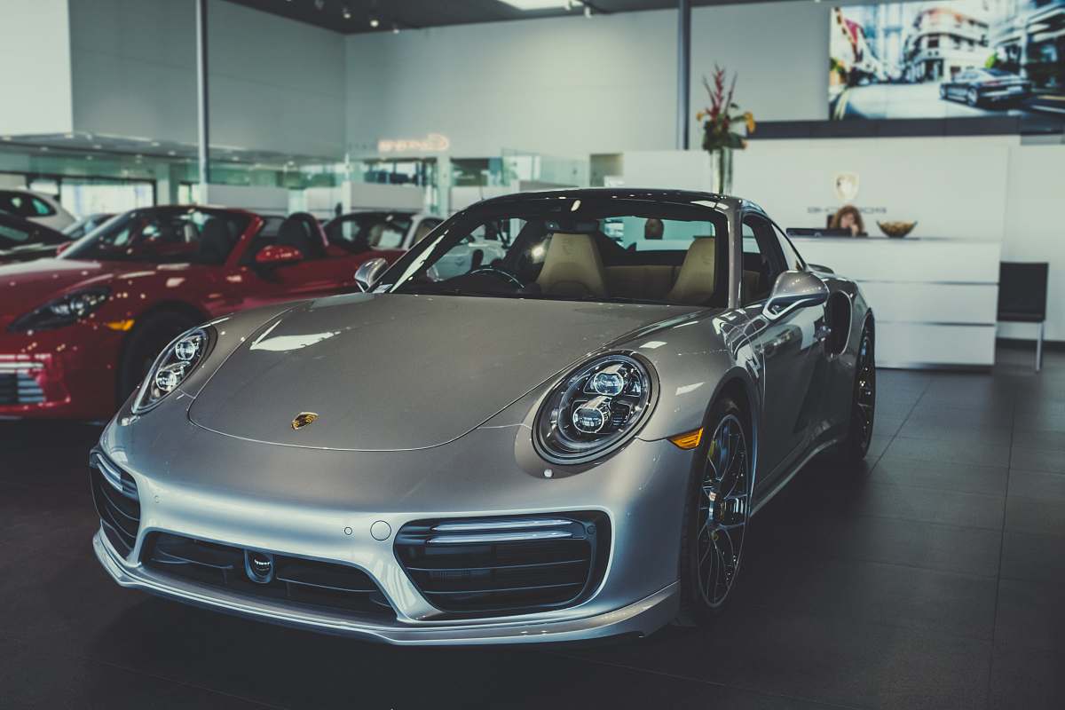 automobile gray Porsche coupe transportation