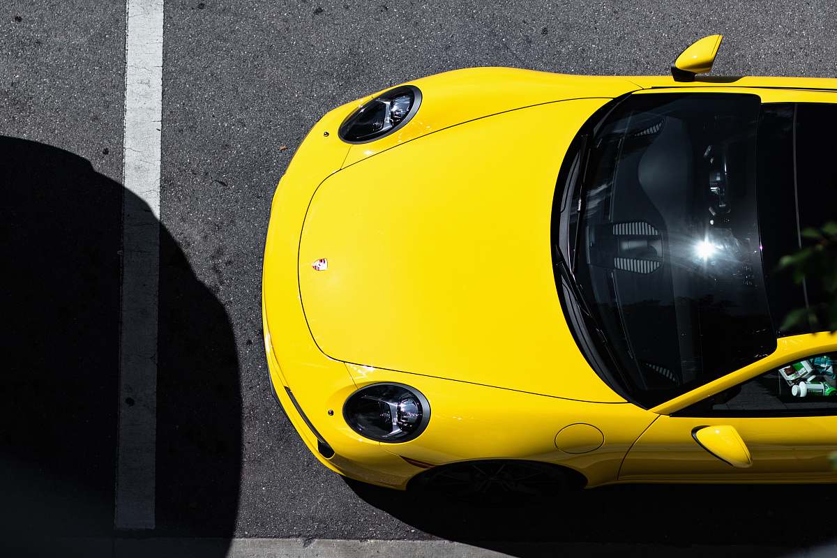 tire yellow Porsche car miami design district