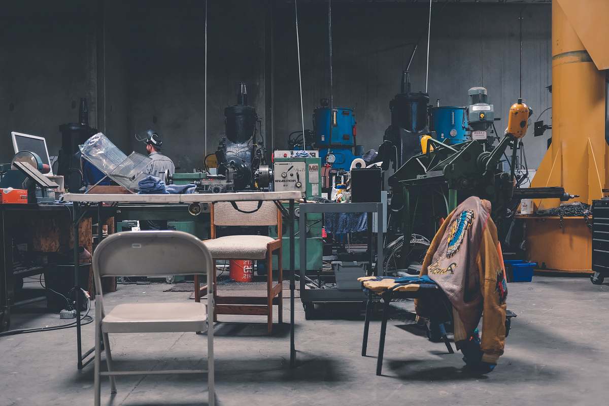 office photo of industrial machines near table furniture