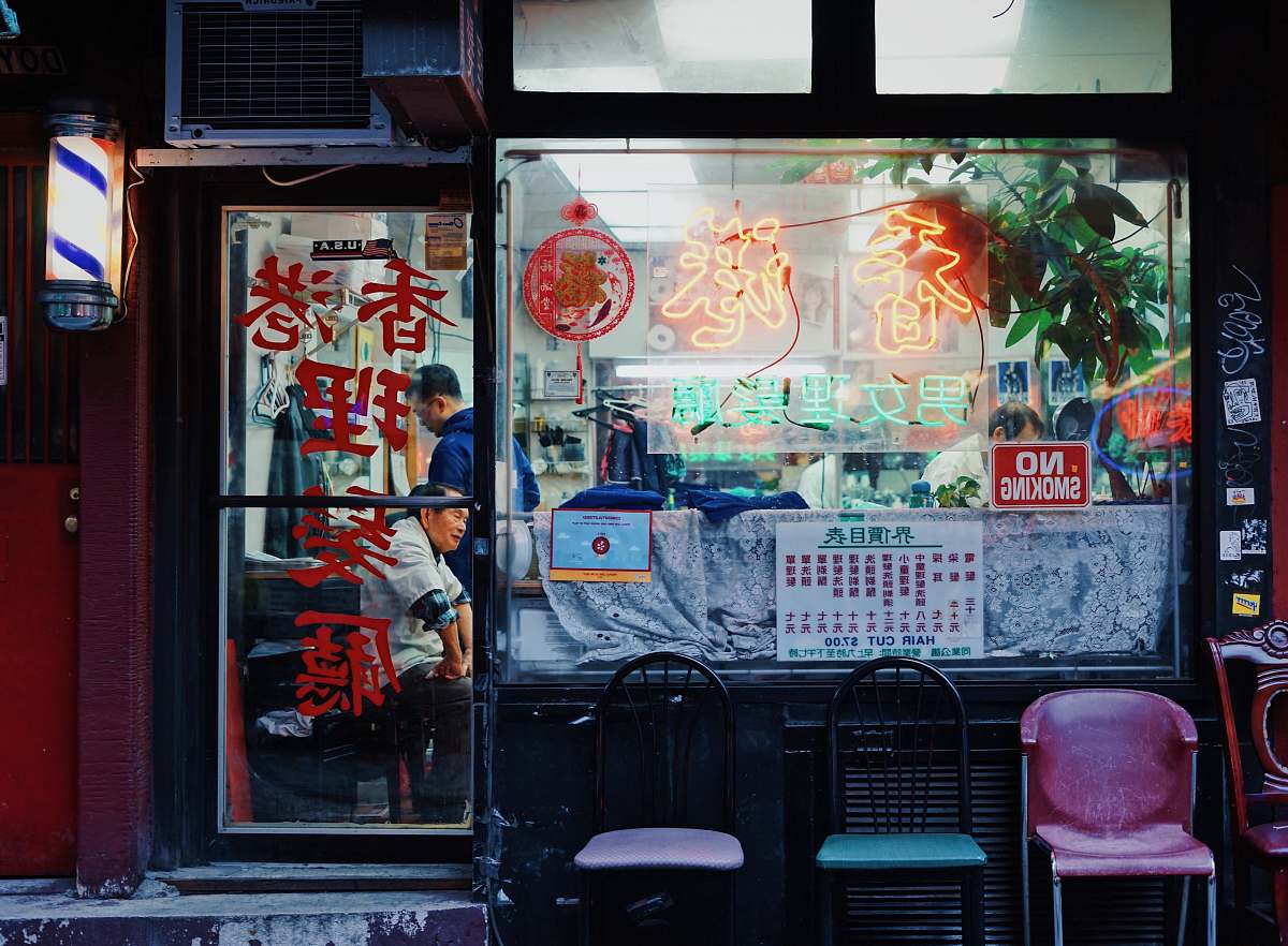 furniture three assorted-color chairs outside store chinatown