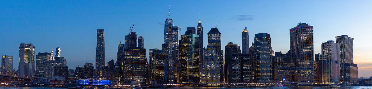 building city skyline during night time high rise
