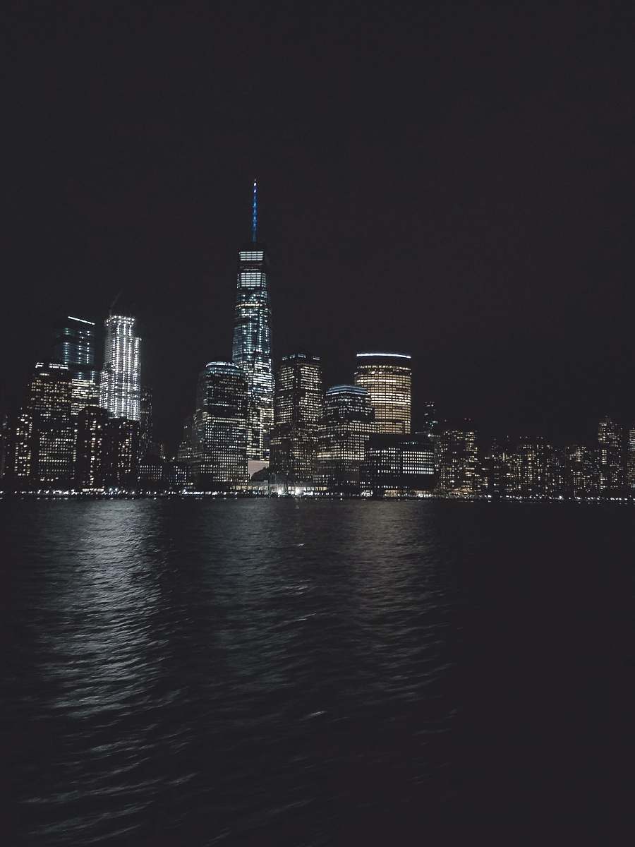 grey photo of concrete high rise building new york