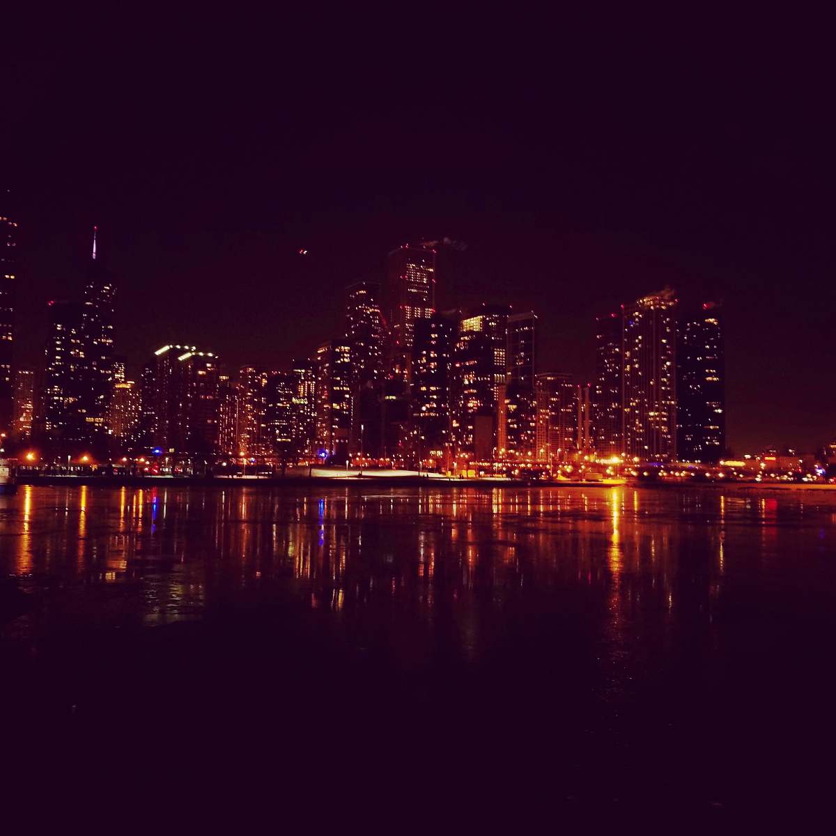 urban photography of commercial buildings at night downtown