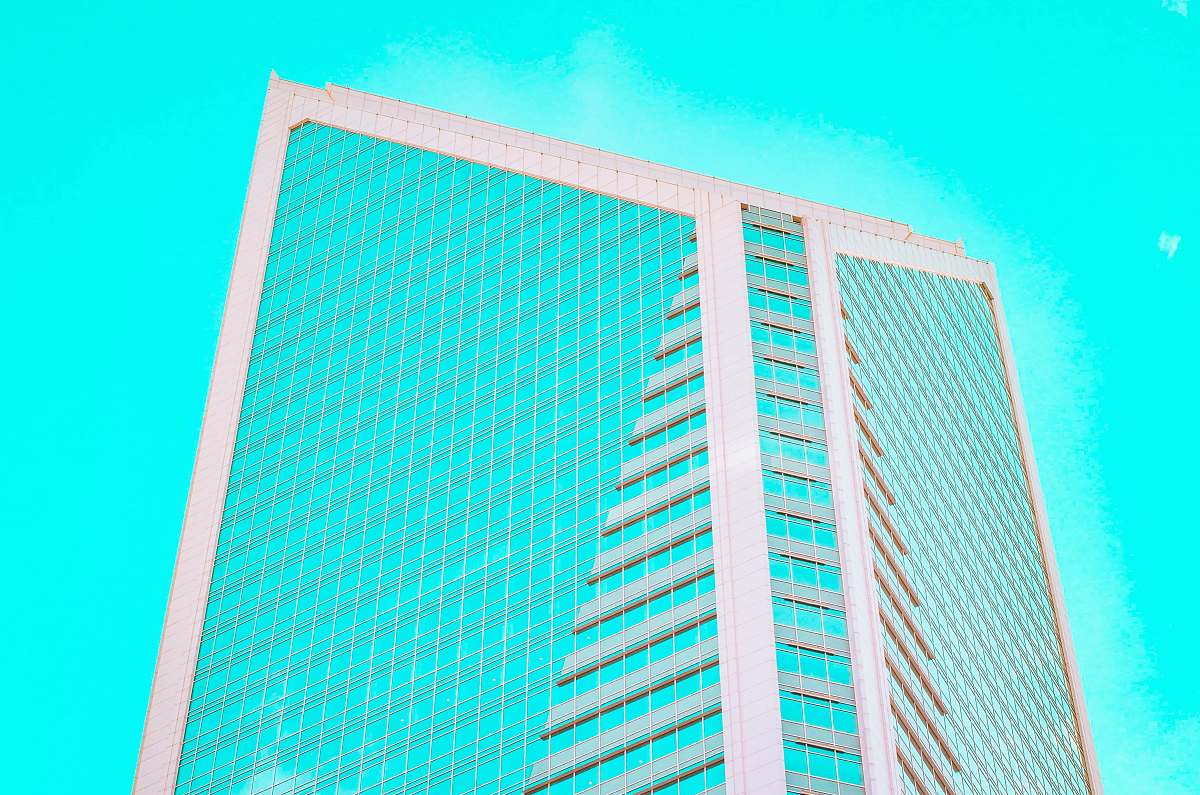 building red and black high rise building office building