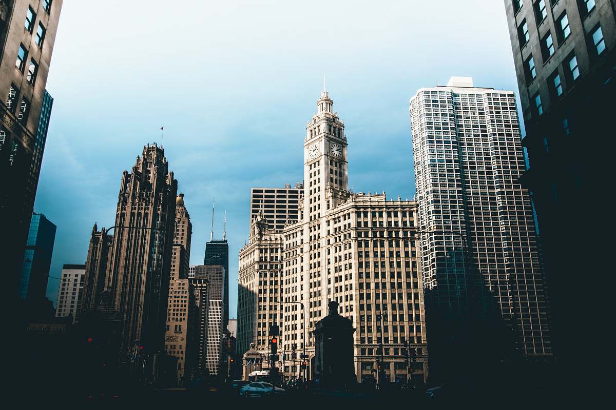 urban white and brown concrete building during daytime building
