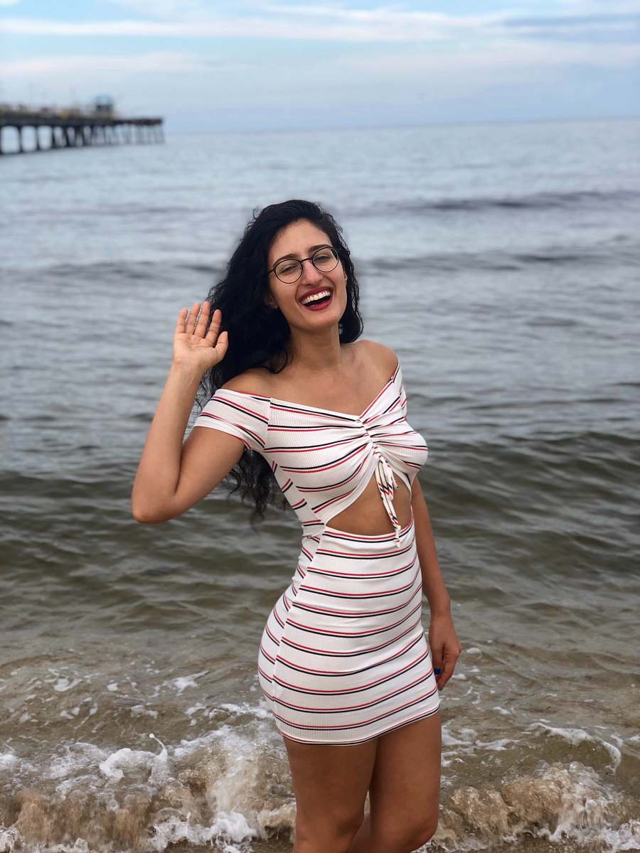 apparel smiling woman wearing white and red dress lauderdale-by-the-sea