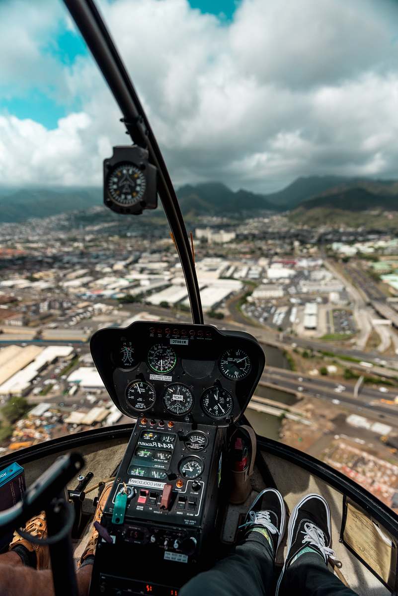 flying person riding air vehicle helicopter