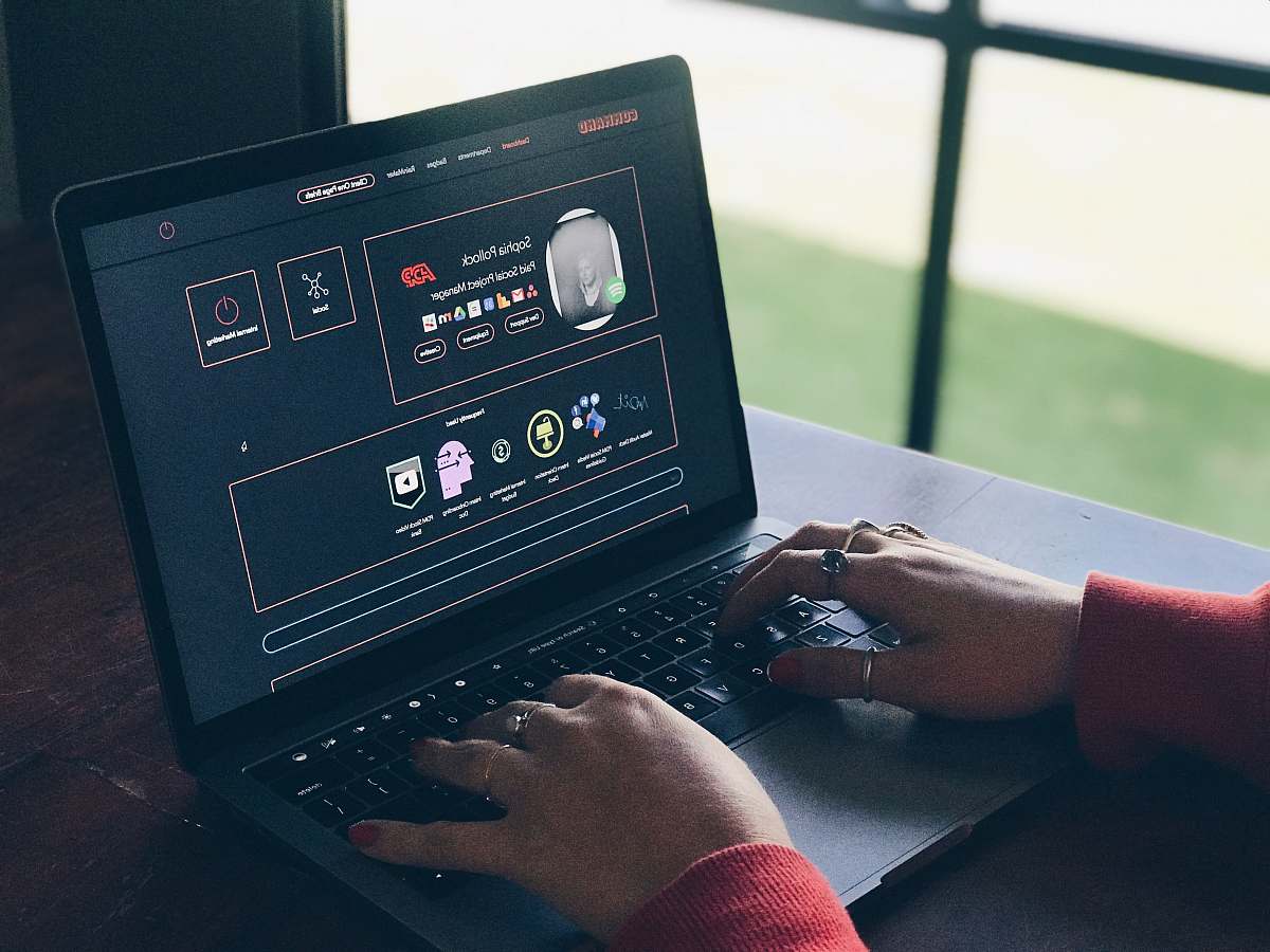 electronics person using laptop computer pc