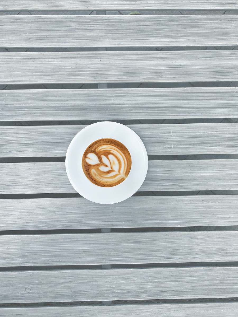 beverage round white espresso coffee on grey striped surface drink