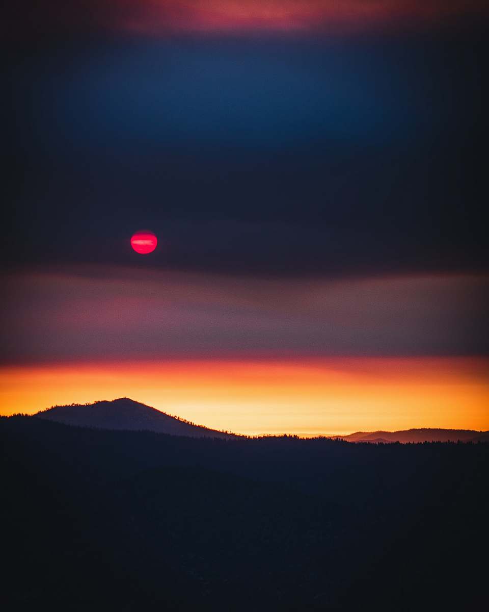 dusk silhouette view of mountain under red moon nature