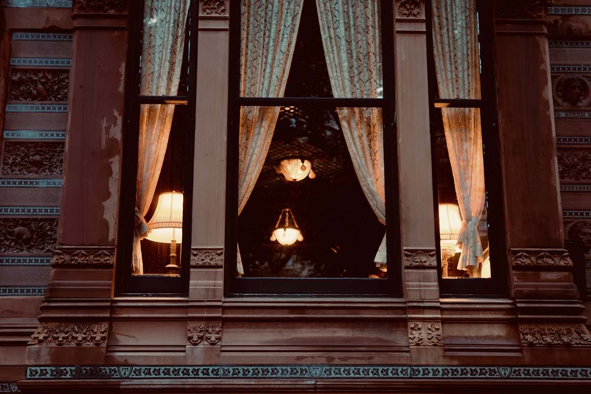 hearth low-angle photography of red house throne