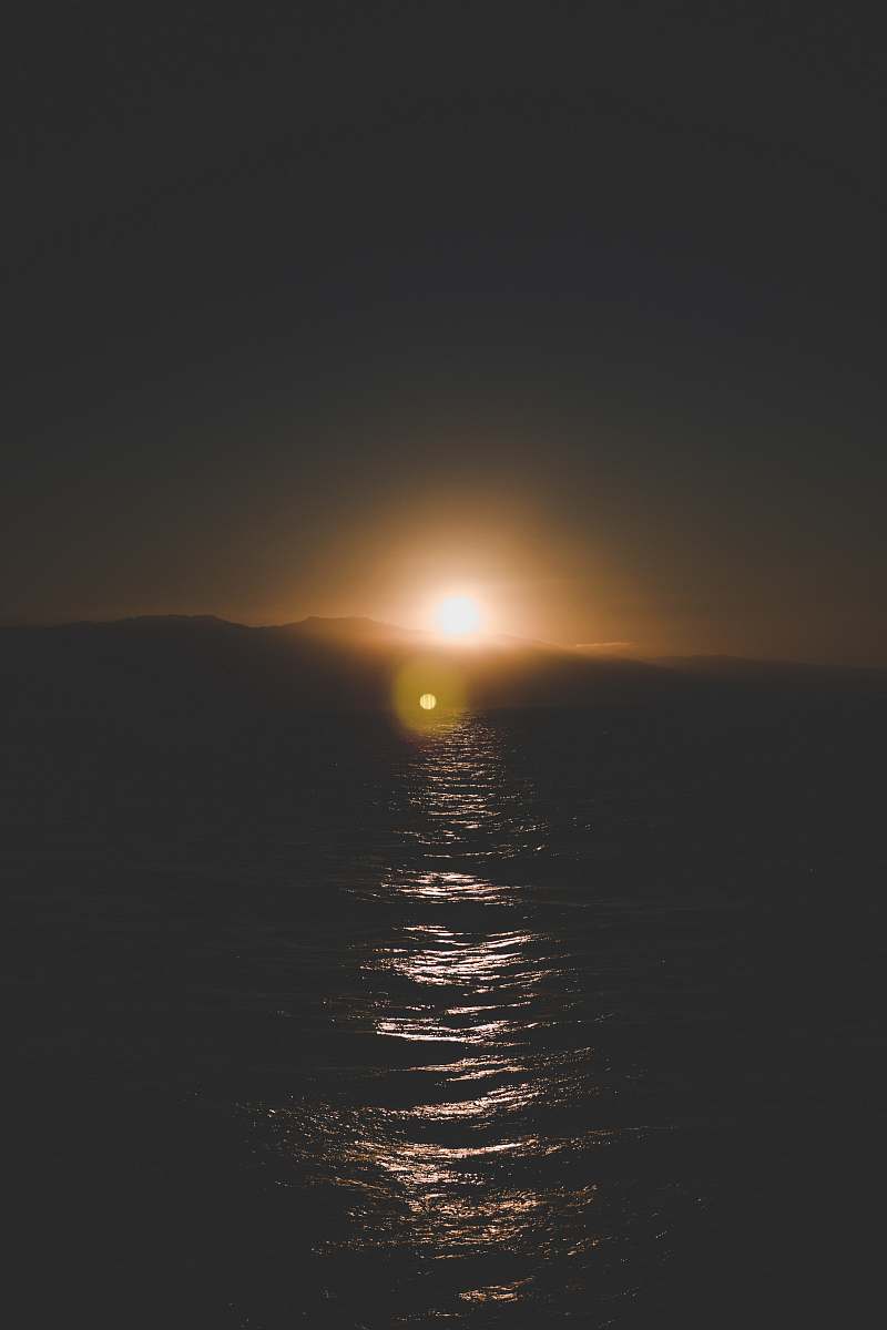 light sunrise over water santa monica pier