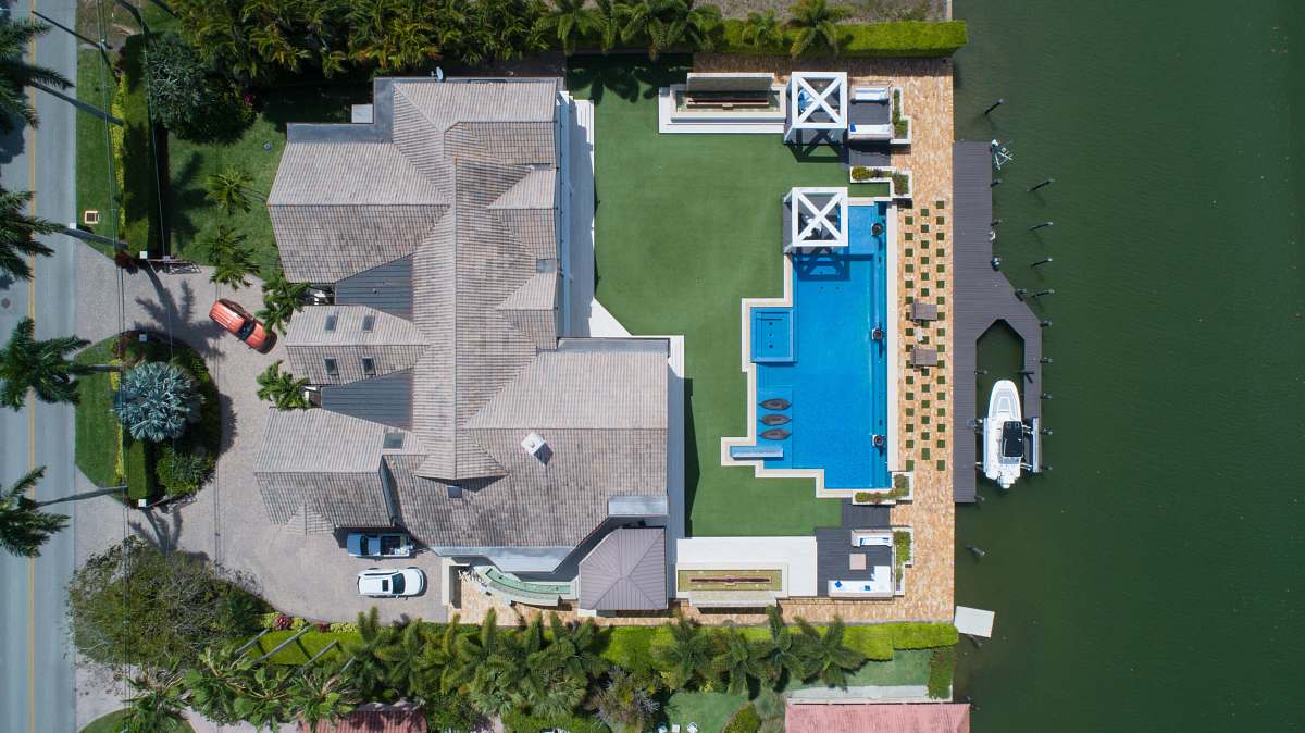 naples bird's eye view of house with pool near body of water jar